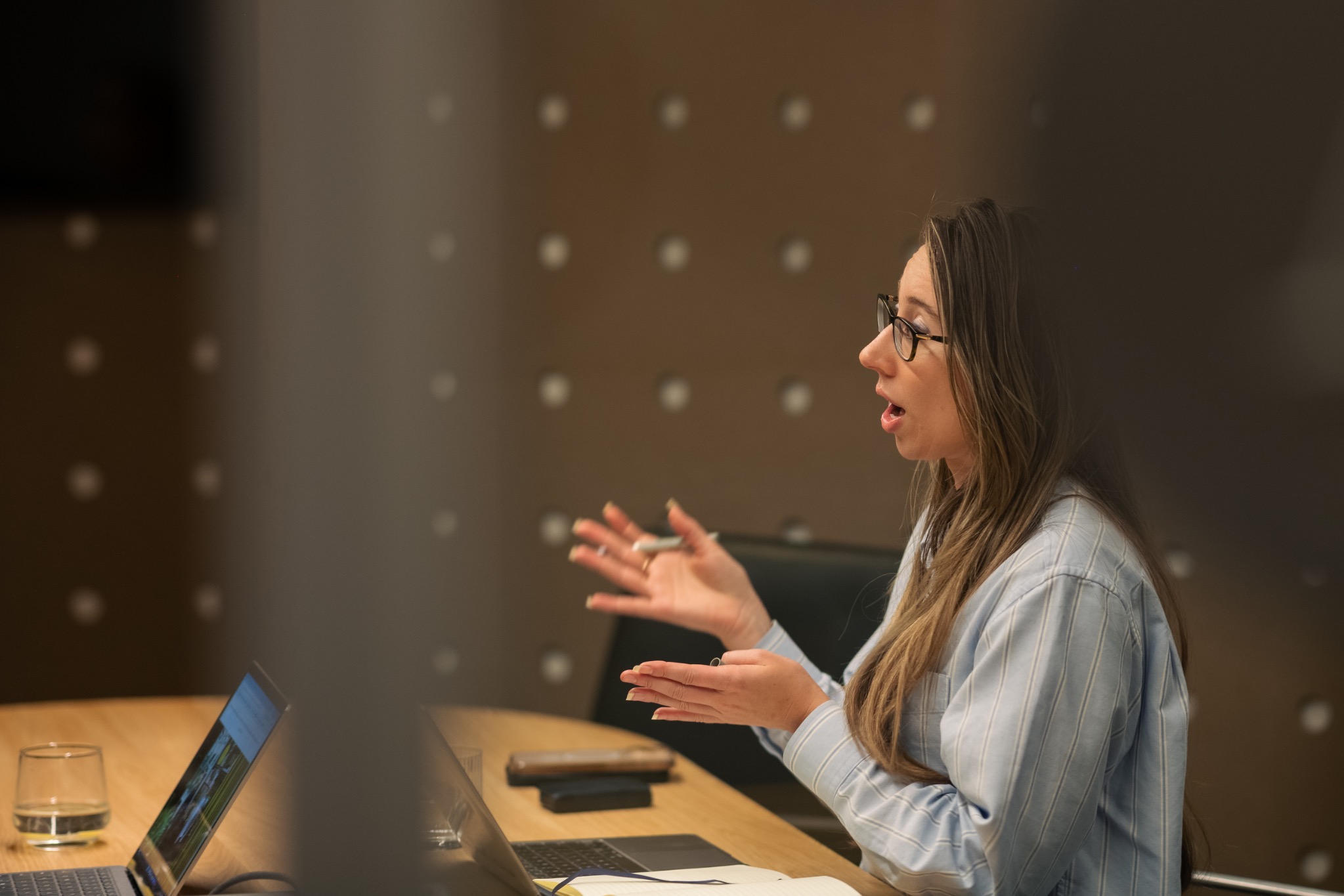 Stephanie Hunt speaking with a client
